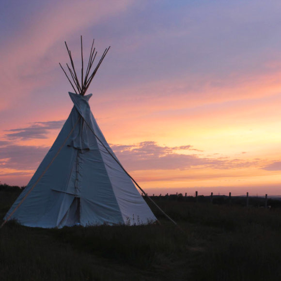 Tipi with setting sun, close to Marlborough Downs.